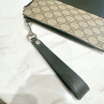 Gucci Supreme Clutch