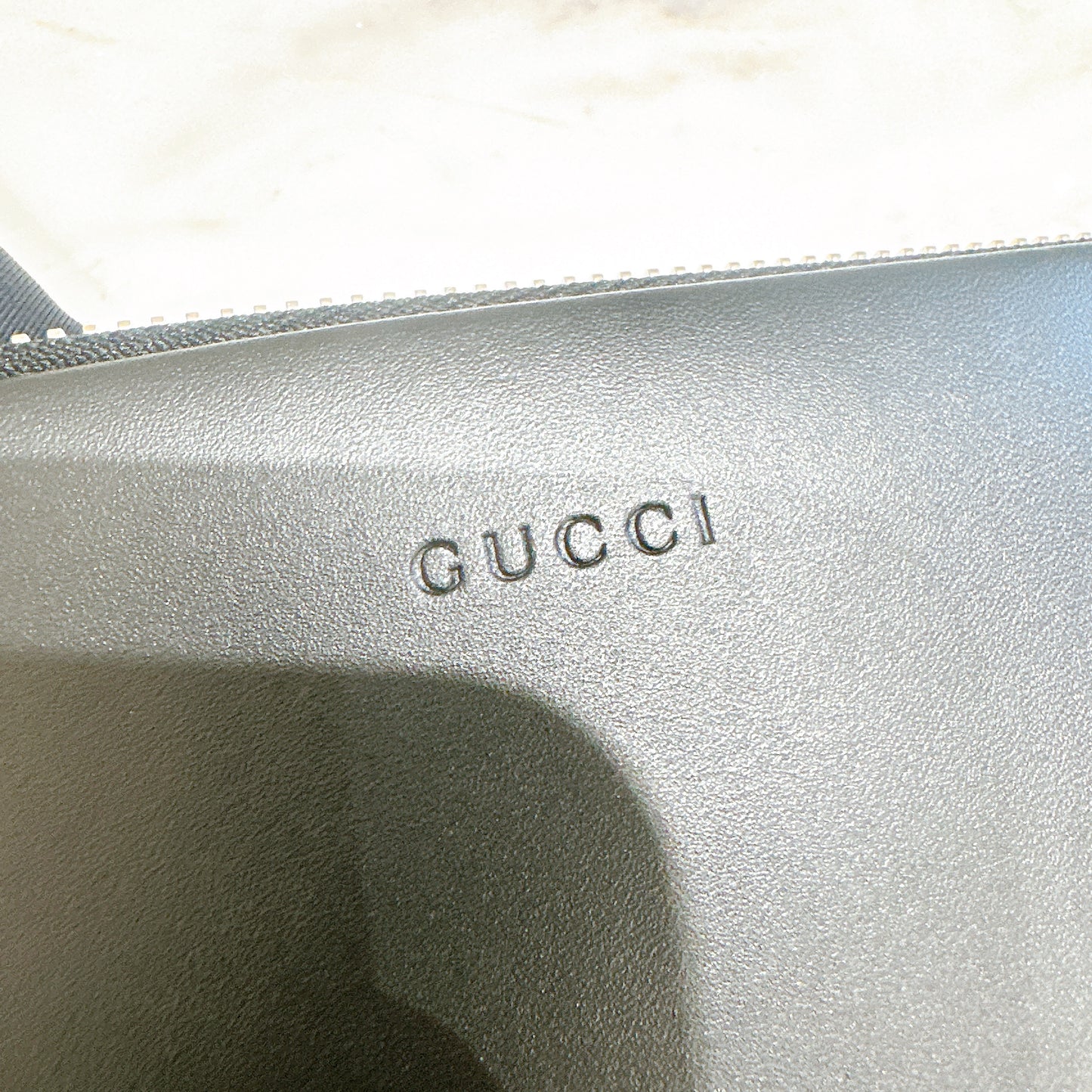 Gucci Supreme Clutch