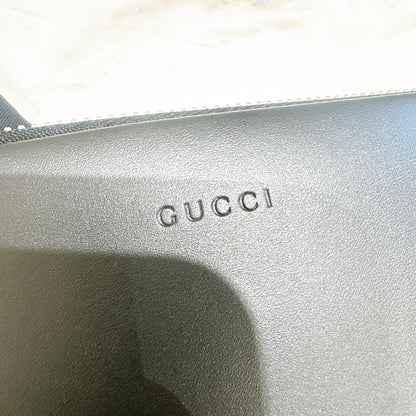 Gucci Supreme Clutch