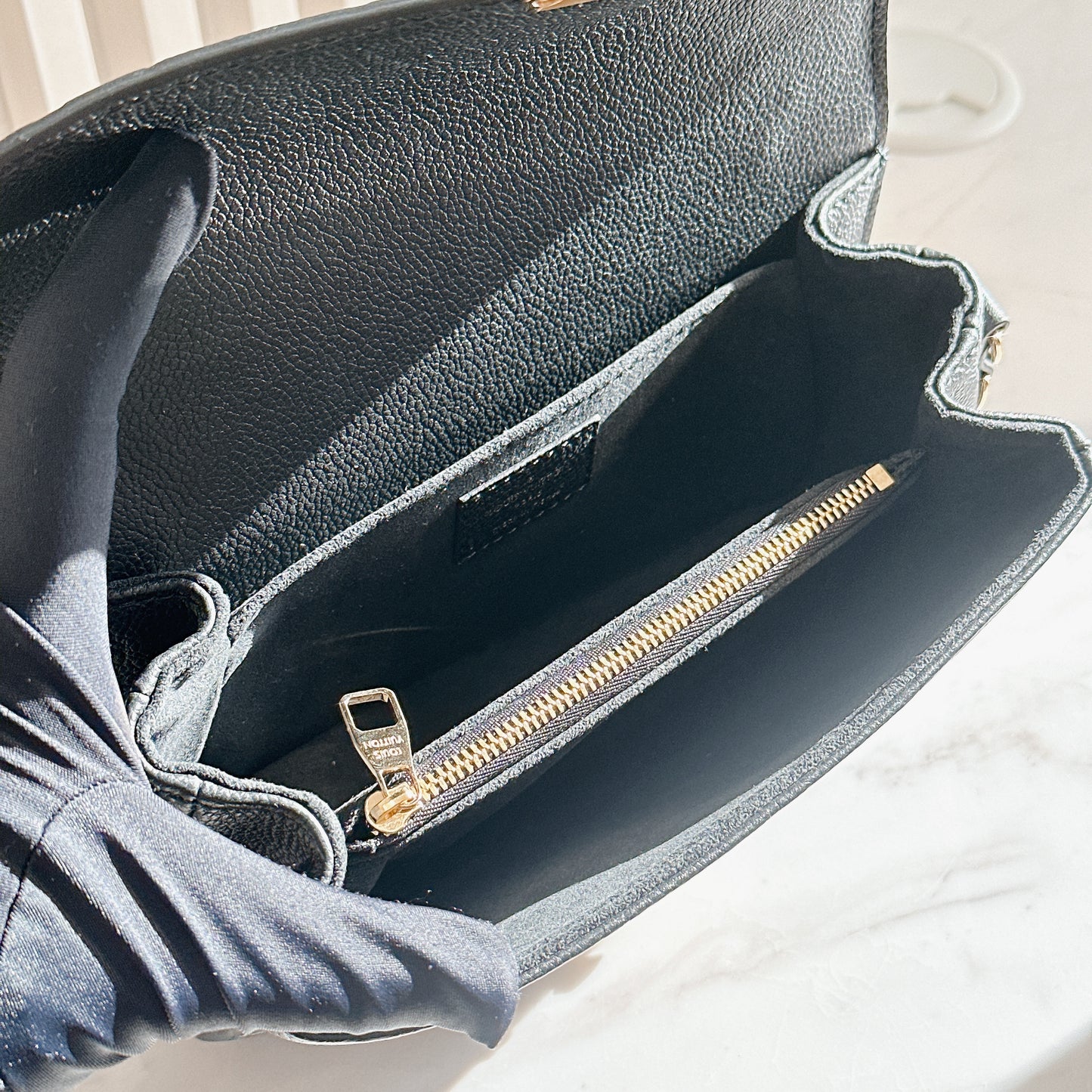 LV Metis East West In Black Empreinte Leather