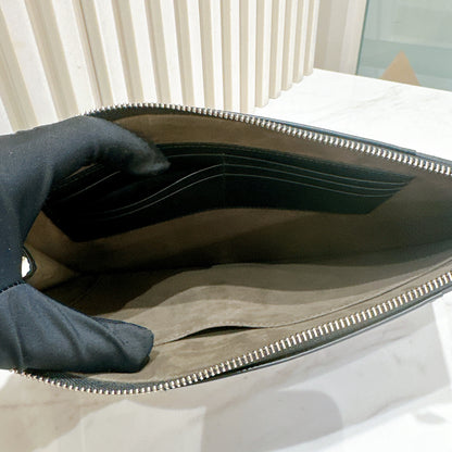 Gucci Supreme Clutch