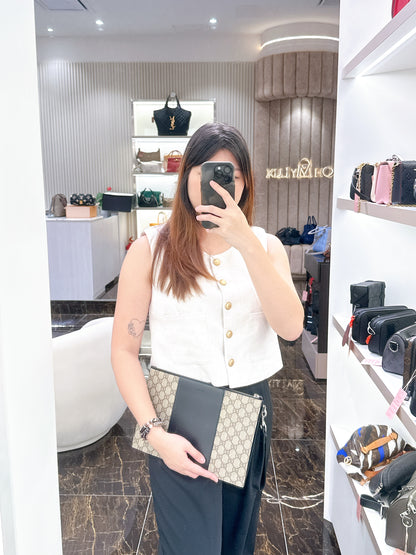 Gucci Supreme Clutch