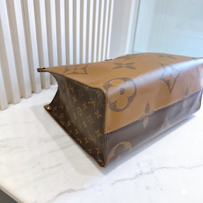 LV On The Go MM in Reverse Monogram
