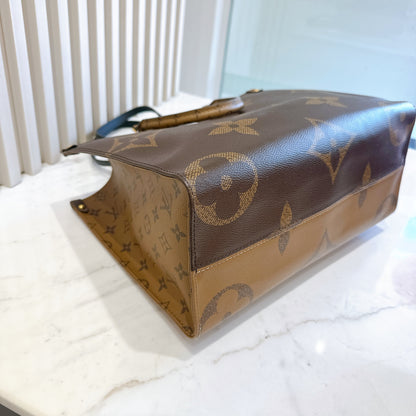 LV On The Go MM in Reverse Monogram