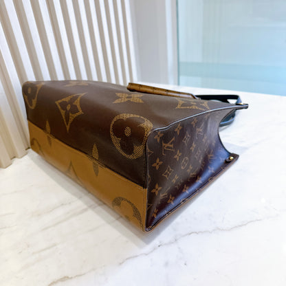 LV On The Go MM in Reverse Monogram