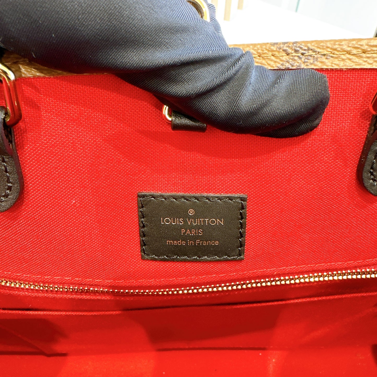 LV On The Go MM in Reverse Monogram