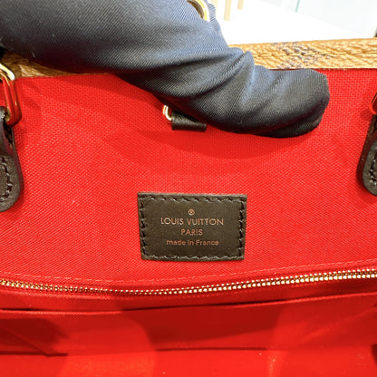 LV On The Go MM in Reverse Monogram